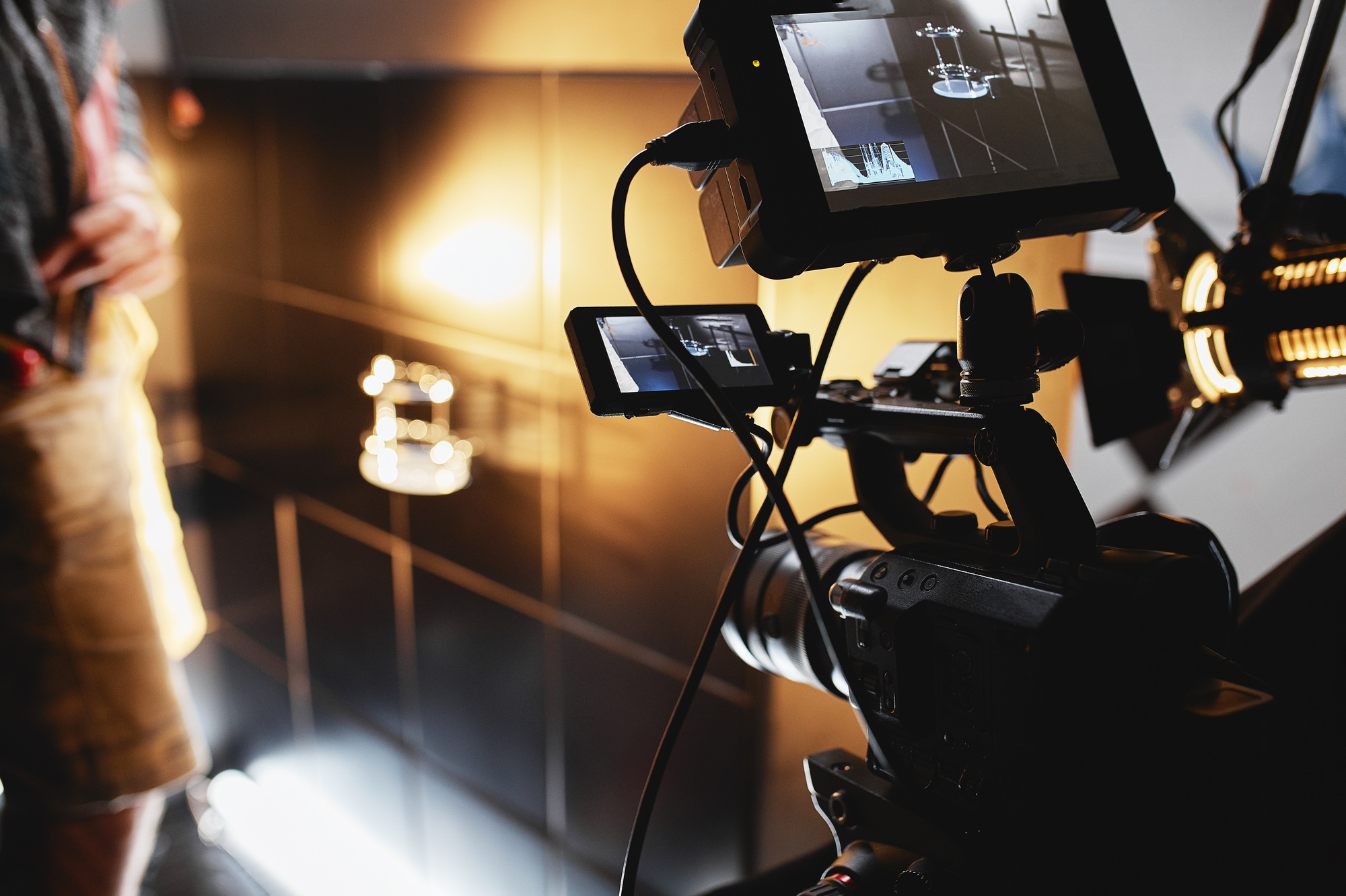 Video production backstage. Behind the scenes of creating video content, a professional team of